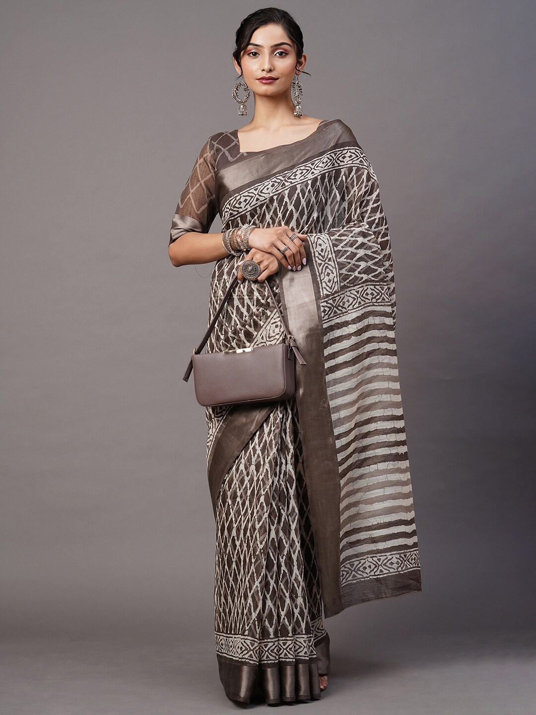 

Mitera Charcoal & White Zari Ikat Saree