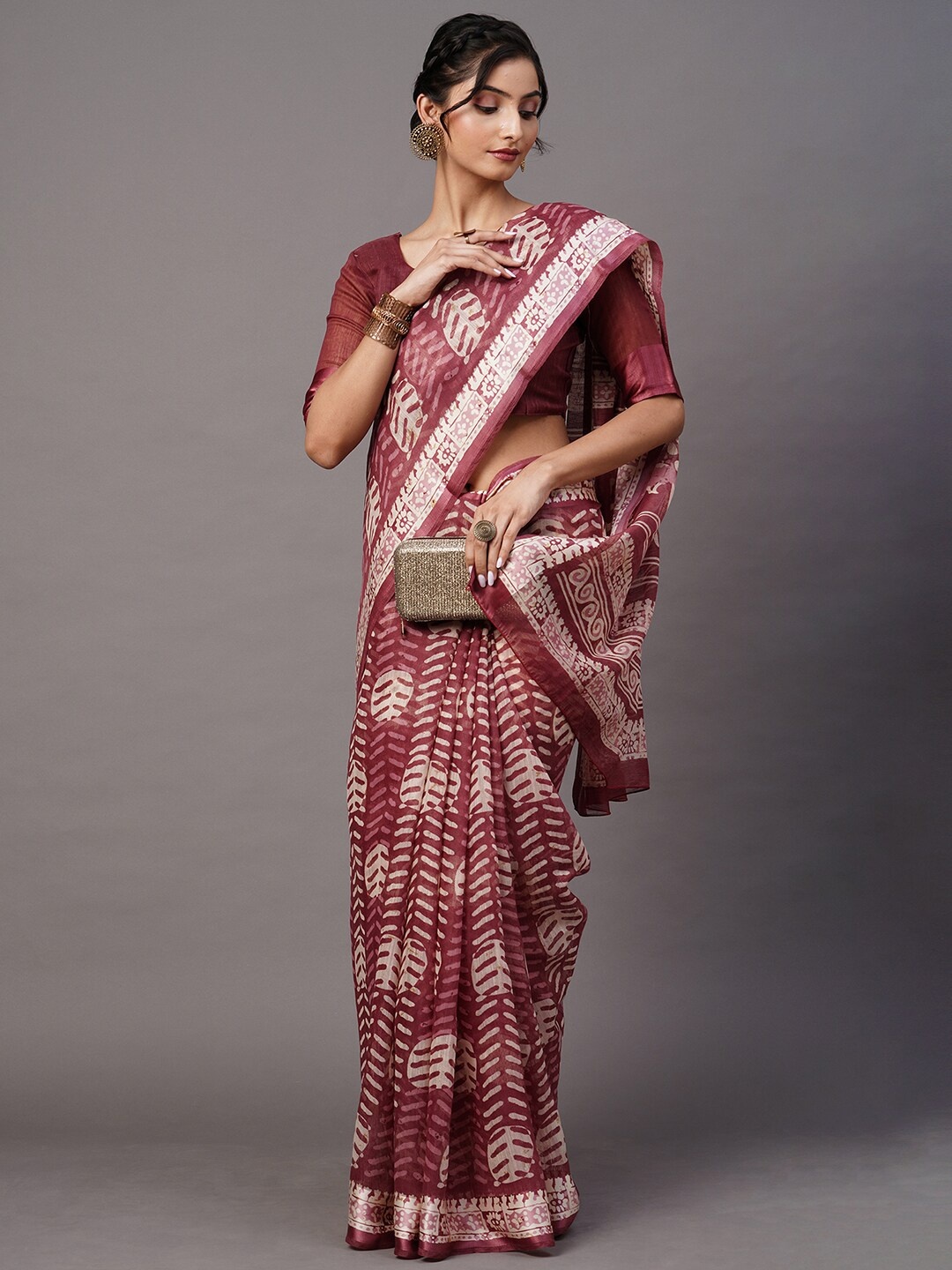 

Mitera Magenta & White Ethnic Motifs Saree