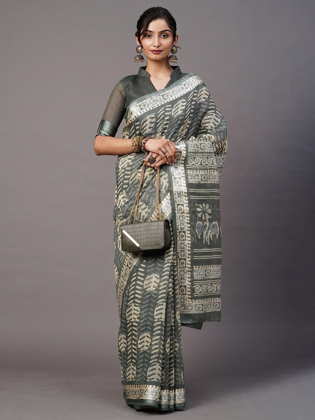 

Mitera Sea Green & White Batik Ikat Saree