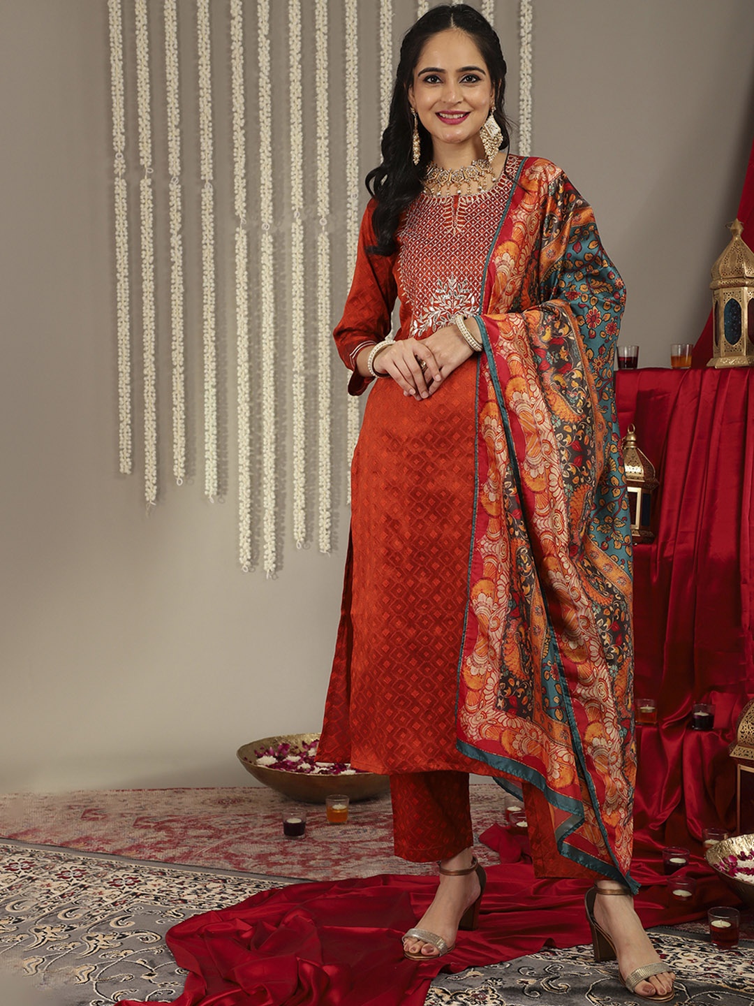 

Varanga Women Rust Yoke Design Kurta with Trousers & With Dupatta