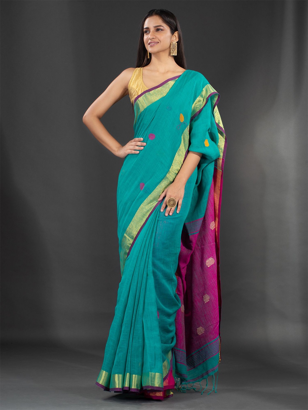 

Charukriti Green & Magenta Woven Design Zari Pure Linen Saree