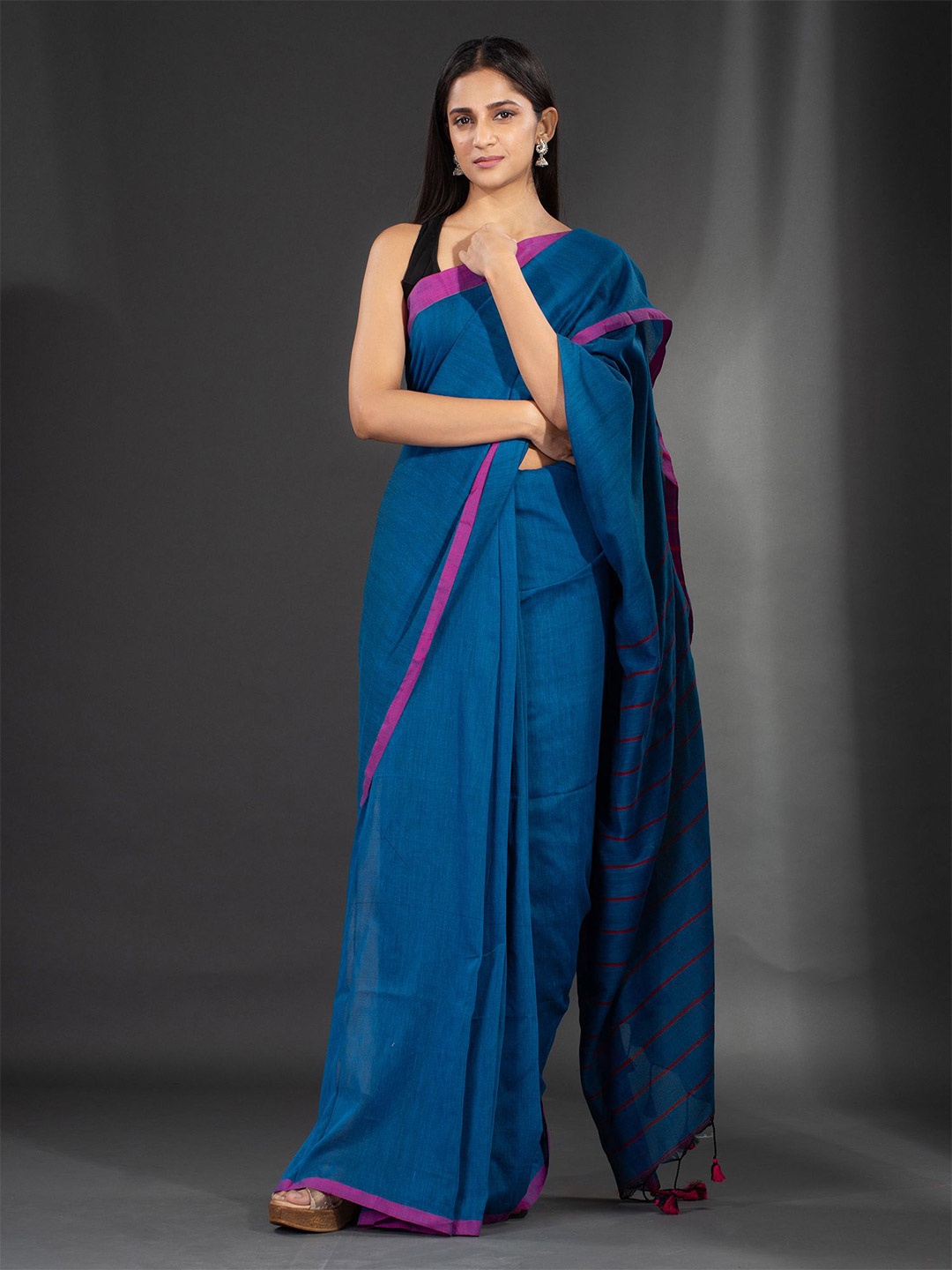 

Charukriti Teal & Pink Pure Cotton Saree