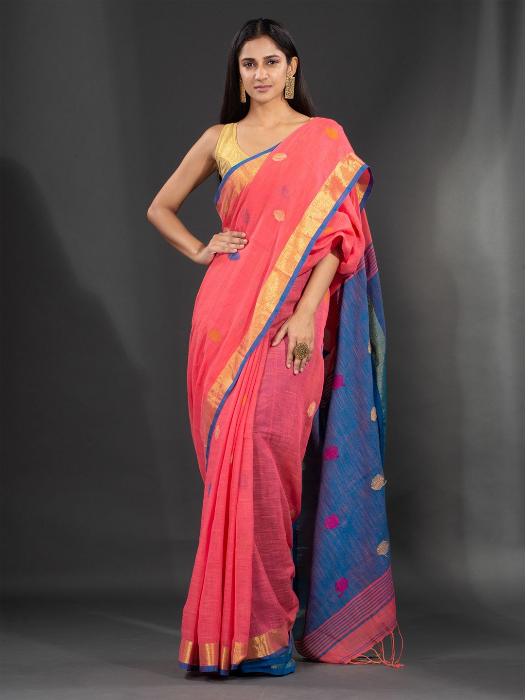 

Charukriti Coral Red & Blue Zari Pure Linen Saree