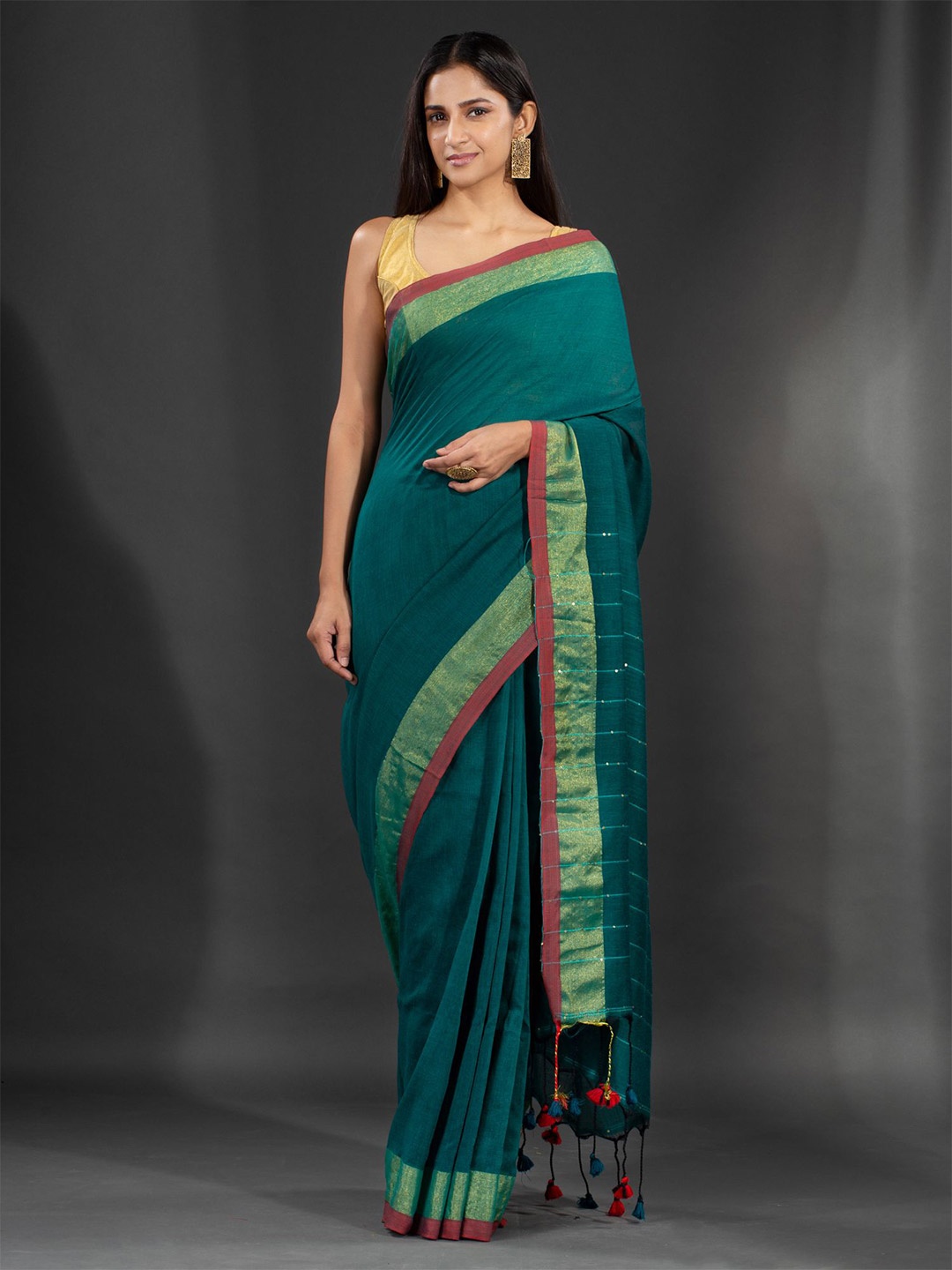 

Charukriti Green Solid Zari Saree