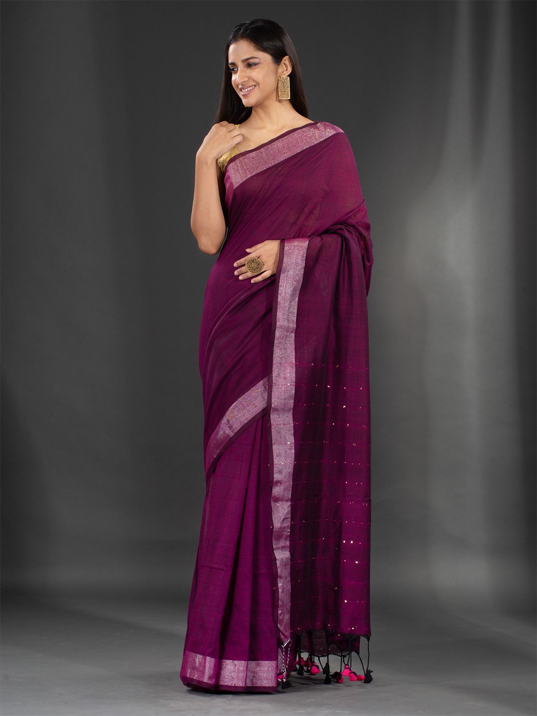 

Charukriti Purple & Silver-Toned Striped Sequinned Saree