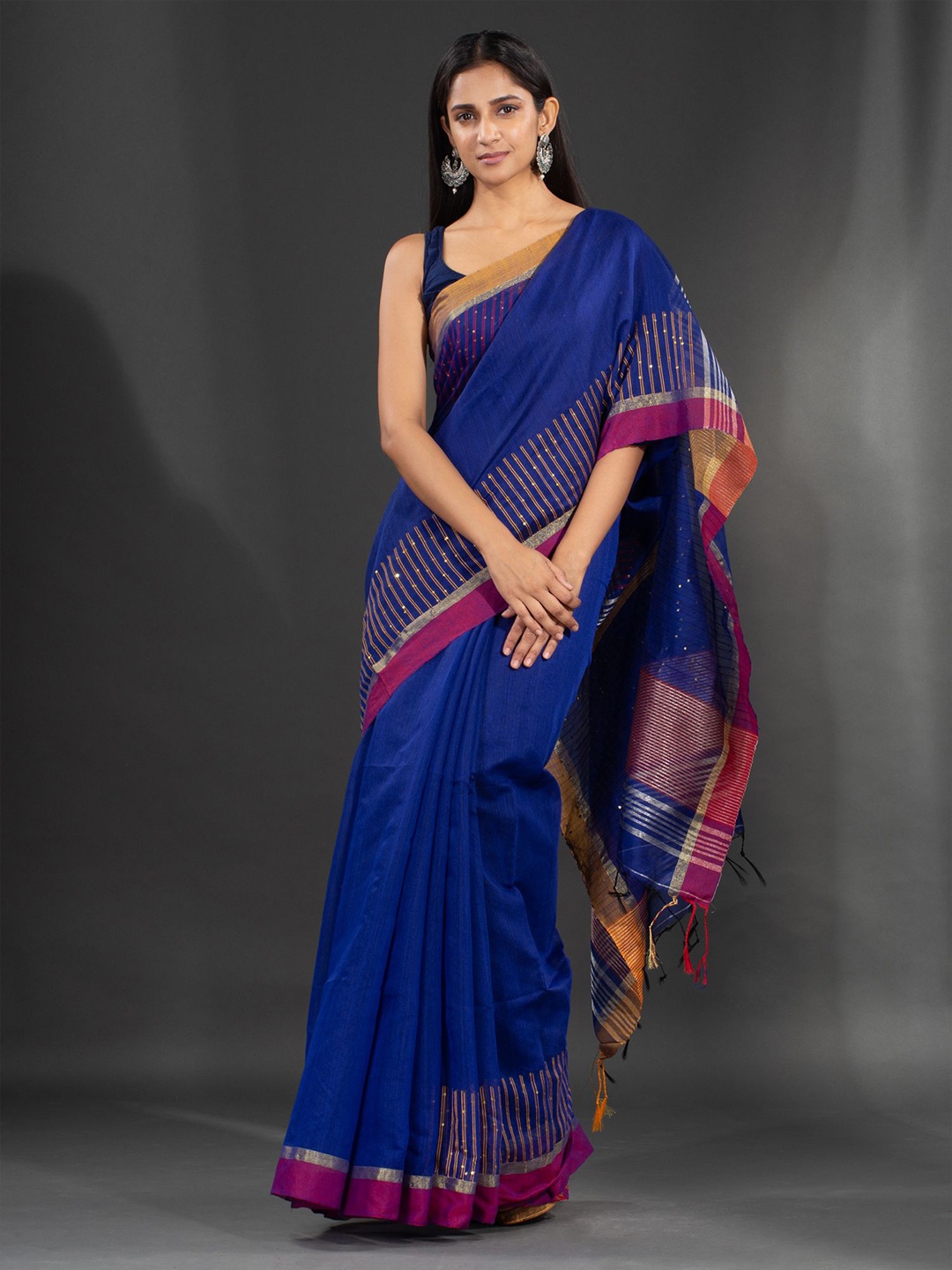 

Charukriti Blue & Pink Embellished Zari Saree