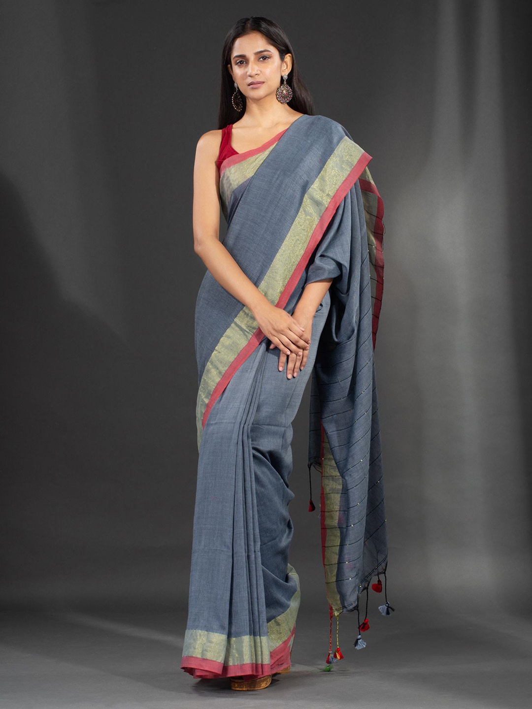 

Charukriti Grey & Pink Solid Zari Saree