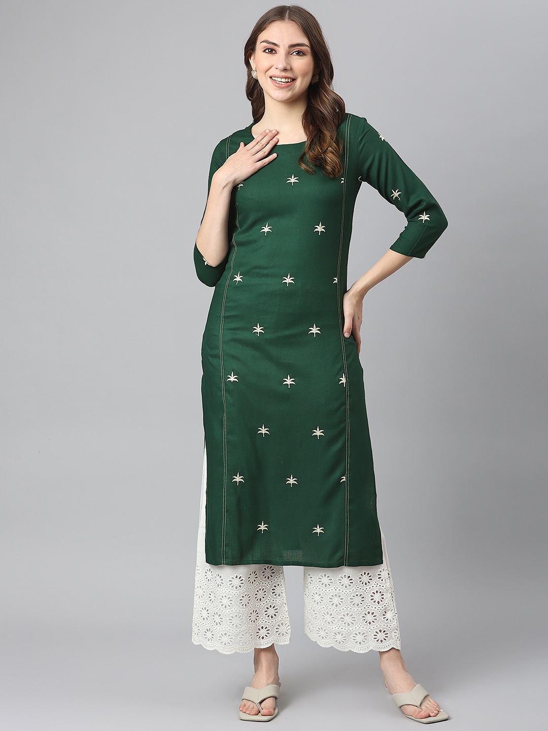 

KALINI Women Green Ethnic Motifs Embroidered Kurta with Palazzos