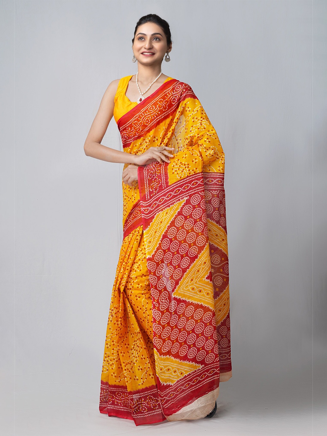 

Unnati Silks Yellow & Red Bandhani Cotton Kota Saree