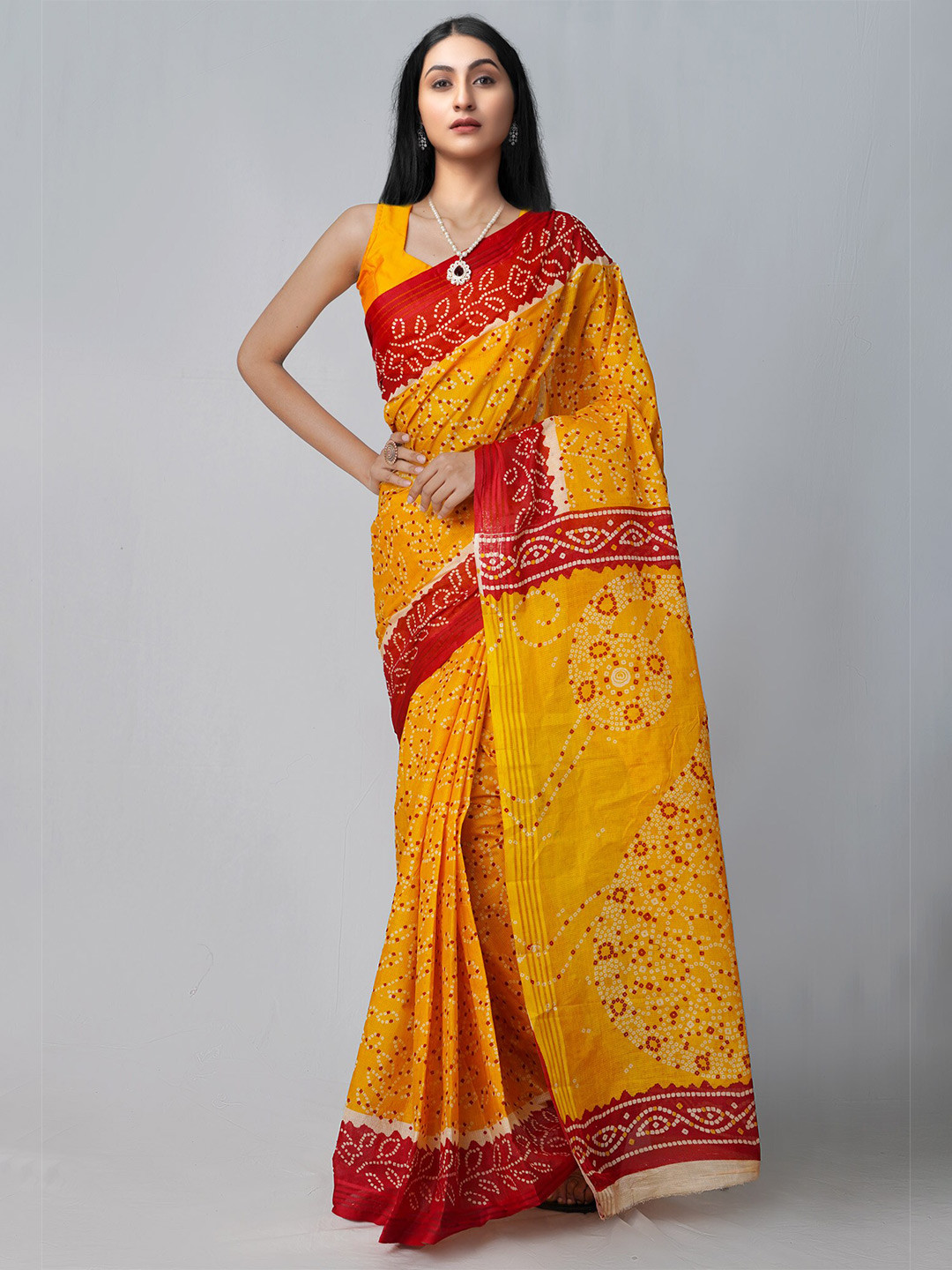 

Unnati Silks Yellow & Red Bandhani Cotton Kota Saree