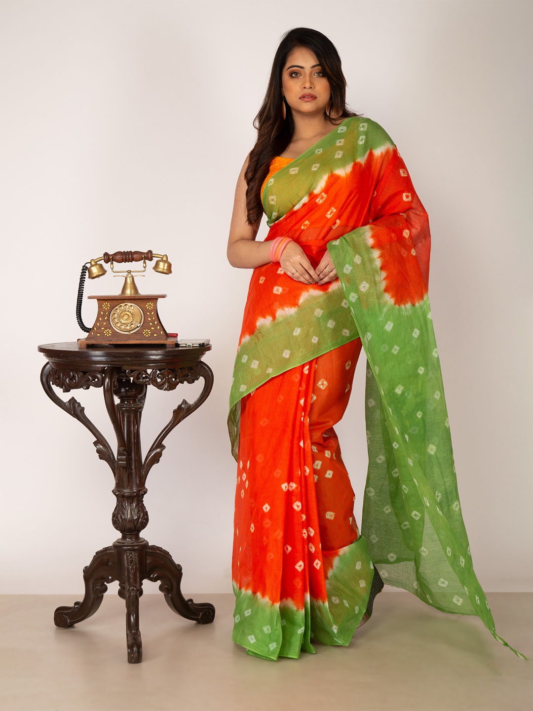

Unnati Silks Orange & Green Bandhani Cotton Kota Saree