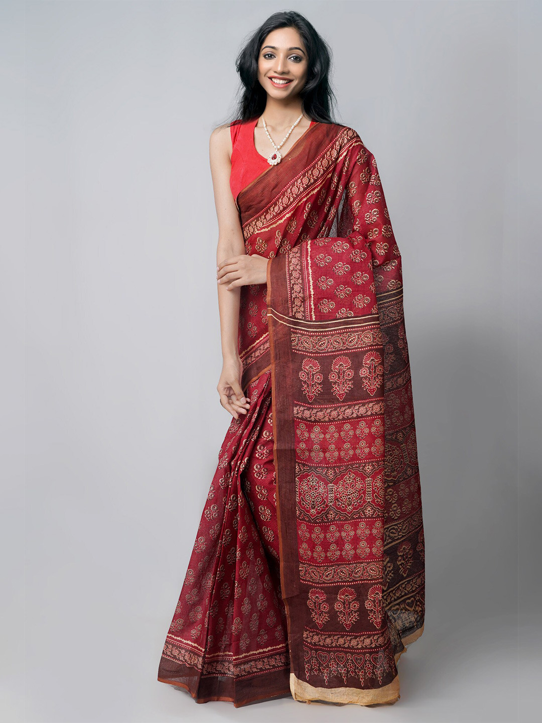 

Unnati Silks Red & Brown Ethnic Motifs Zari Pure Cotton Kota Saree