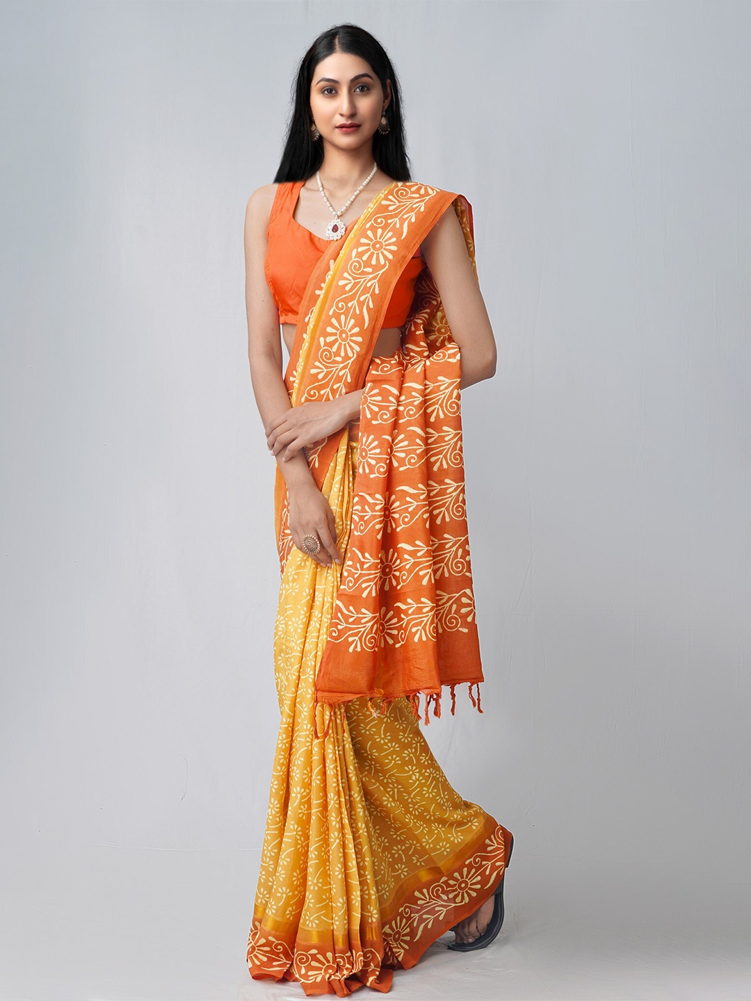 

Unnati Silks Yellow & White Ethnic Motifs Zari Silk Blend Patola Saree