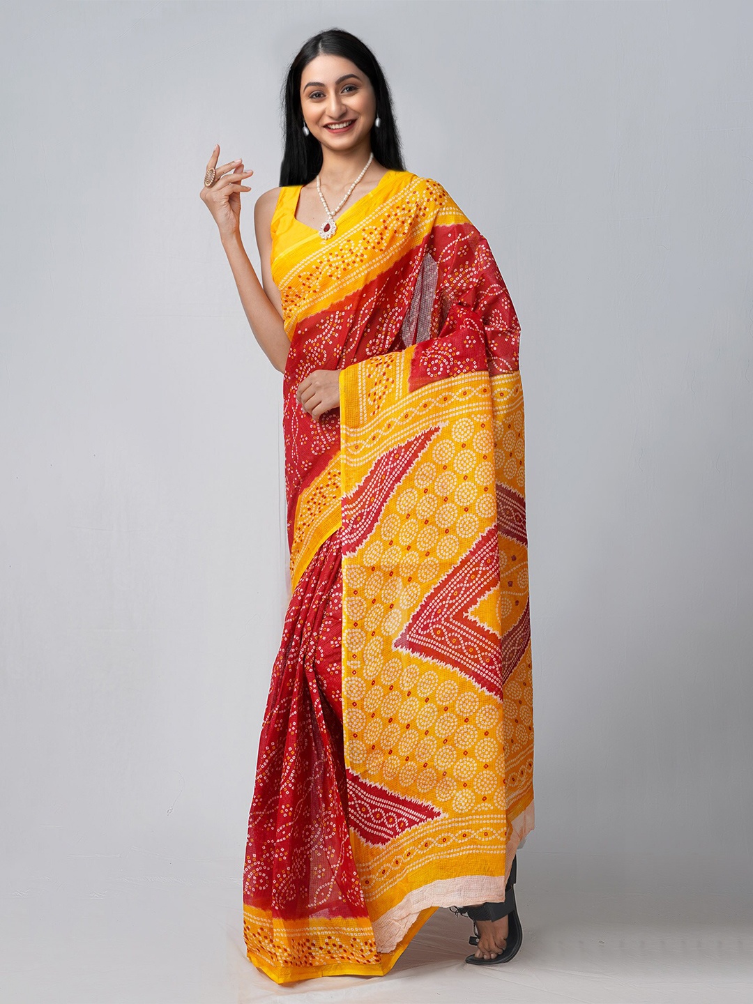 

Unnati Silks Yellow & Red Bandhani Pure Cotton Kota Saree