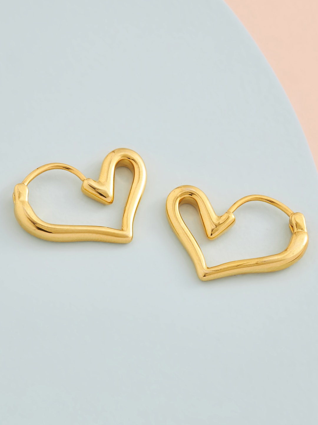 

Kushal's Fashion Jewellery Gold-Toned Heart Shaped Studs Earrings