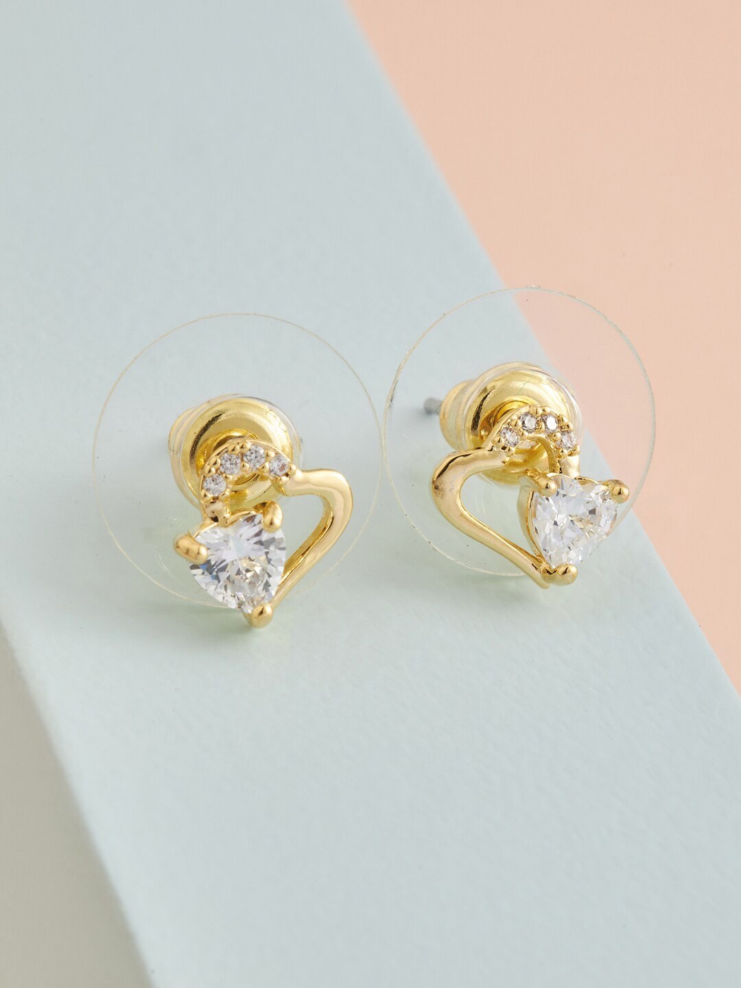 

Kushal's Fashion Jewellery Gold-Toned & White Heart Shaped Studs Earrings