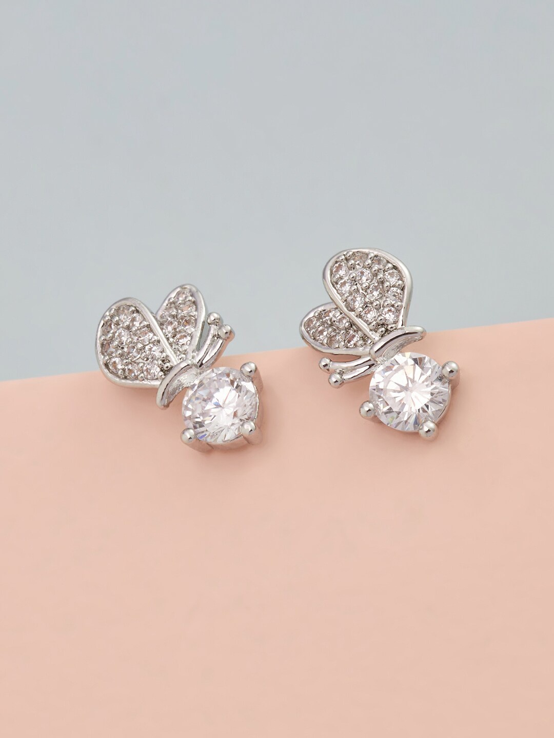

Kushal's Fashion Jewellery Silver-Toned & White Floral Studs Earrings