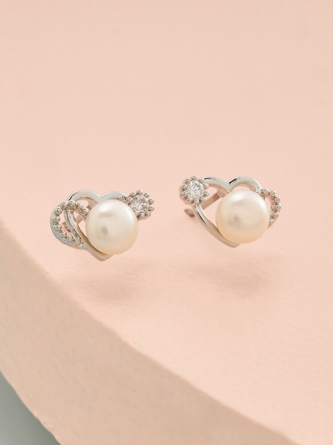 

Kushal's Fashion Jewellery White Rhodium-Plated Heart Shaped CZ Studded Earrings