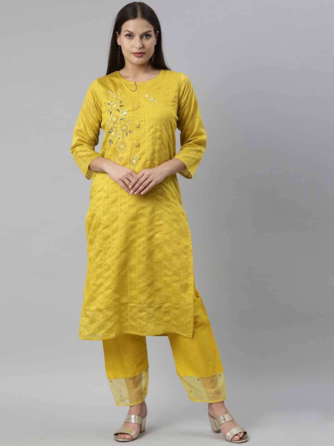 

Neerus Women Yellow Ethnic Motifs Printed Beads and Stones Chanderi Cotton Kurta with Trousers