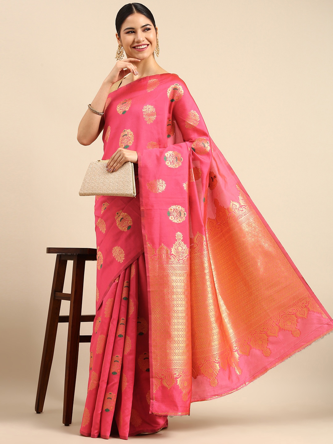 

Anouk Pink & Gold-Toned Ethnic Motifs Zari Silk Blend Banarasi Saree