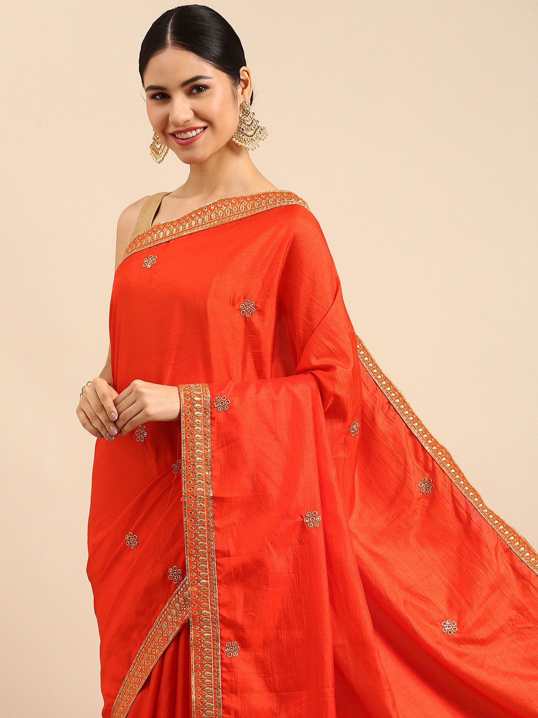 

Anouk Orange & Gold-Toned Ethnic Motifs Embroidered Silk Blend Saree