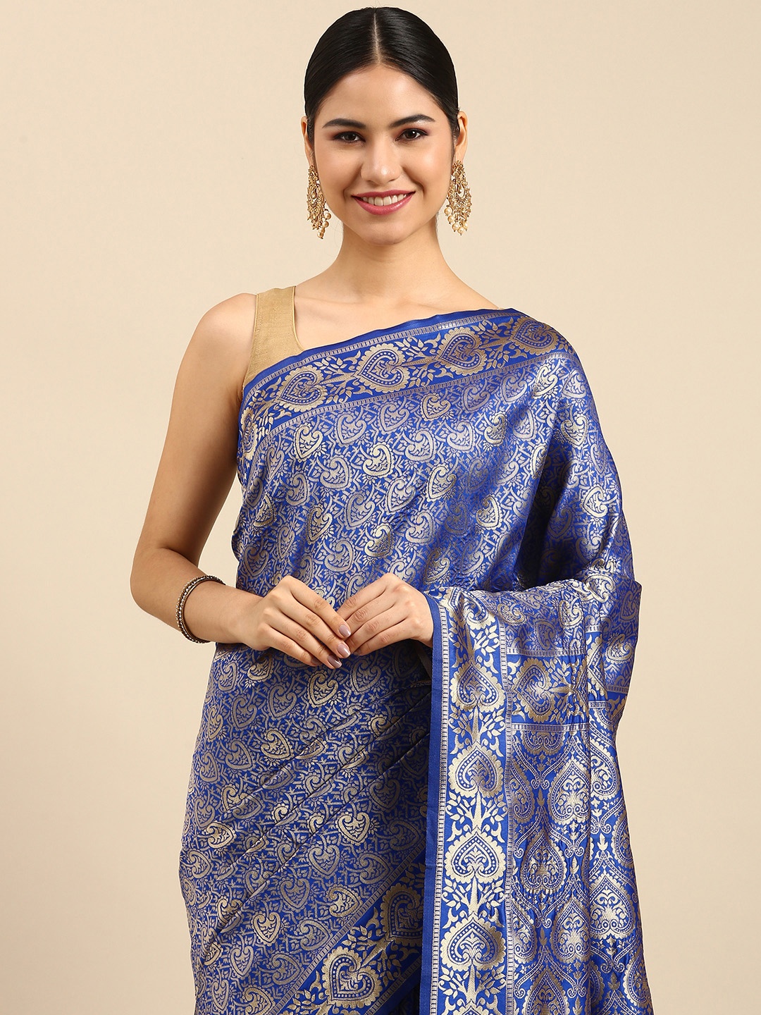 

Anouk Blue & Gold-Toned Ethnic Motifs Zari Silk Blend Banarasi Saree