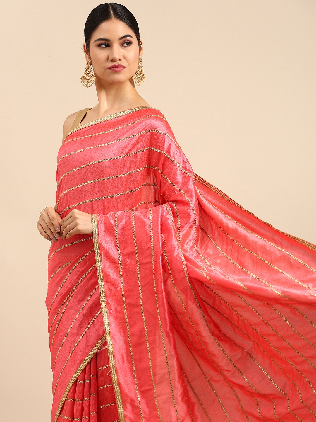

Anouk Pink & Gold-Toned Striped Sequinned Silk Blend Saree