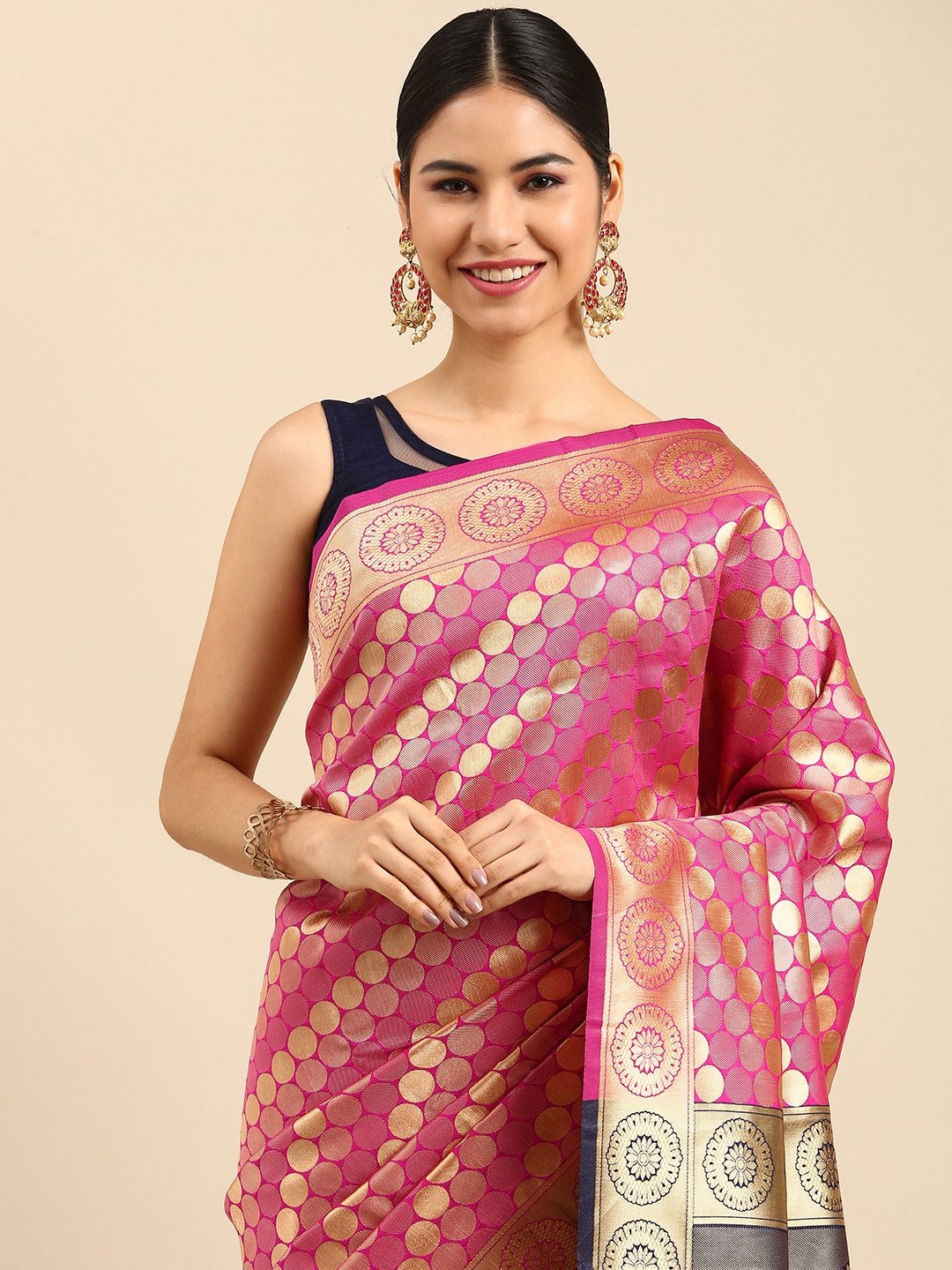 

Anouk Pink & Gold-Toned Ethnic Motifs Zari Silk Blend Banarasi Saree