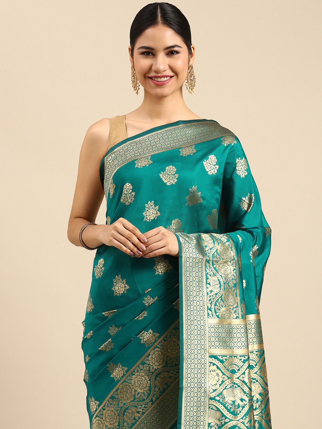 

Anouk Turquoise Blue & Gold-Toned Ethnic Motifs Zari Silk Blend Banarasi Saree