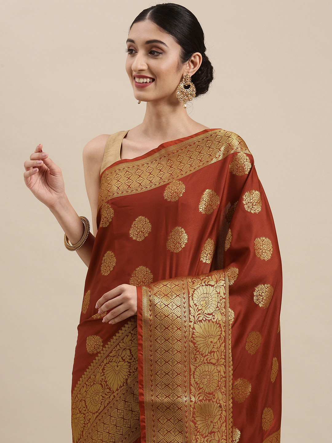 

Mitera Maroon & Golden Ethnic Motifs Woven Design Zari Banarasi Saree