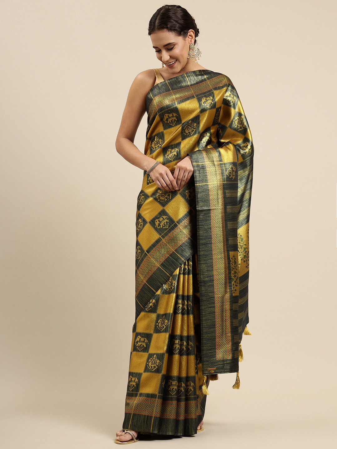 

CliqSilk Green & Golden Printed Patola Saree