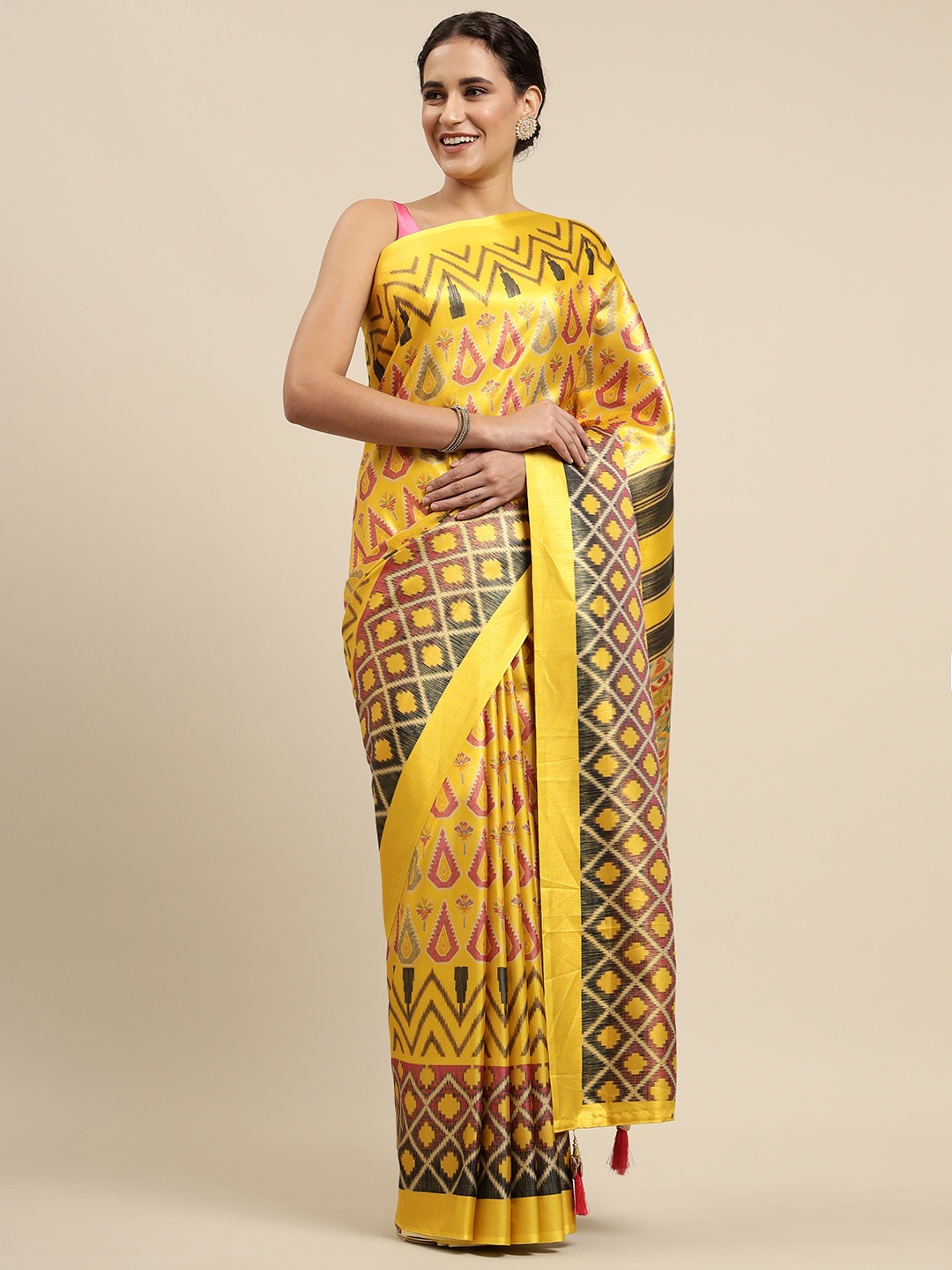 

CliqSilk Yellow Printed Ikat Saree