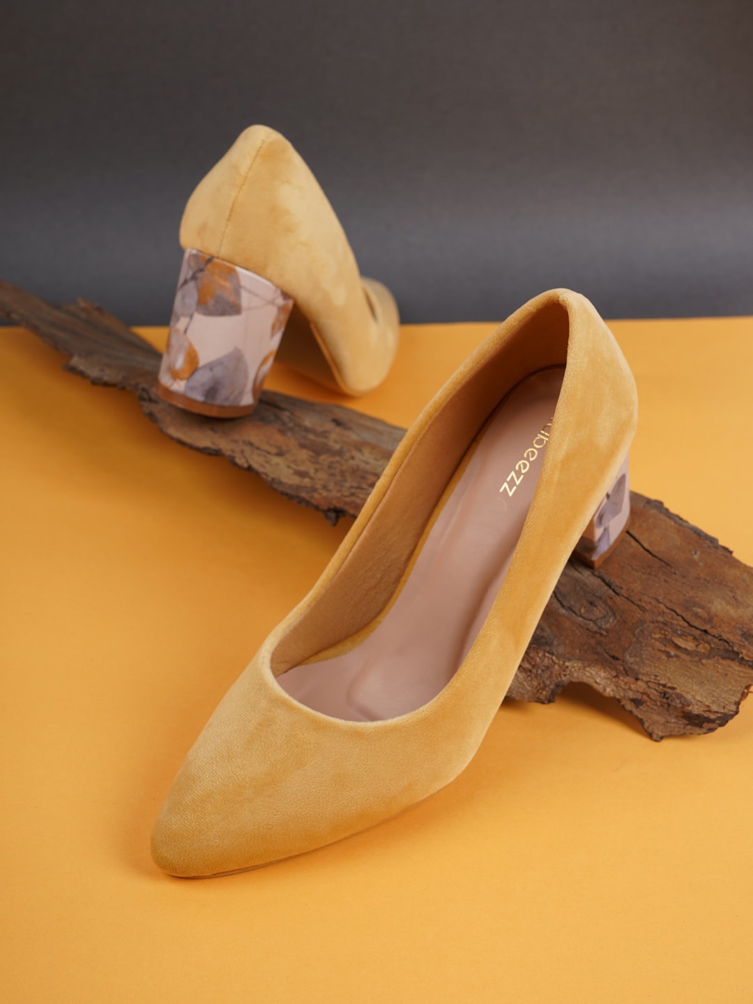 

Rubeezz Yellow Printed Block Pumps