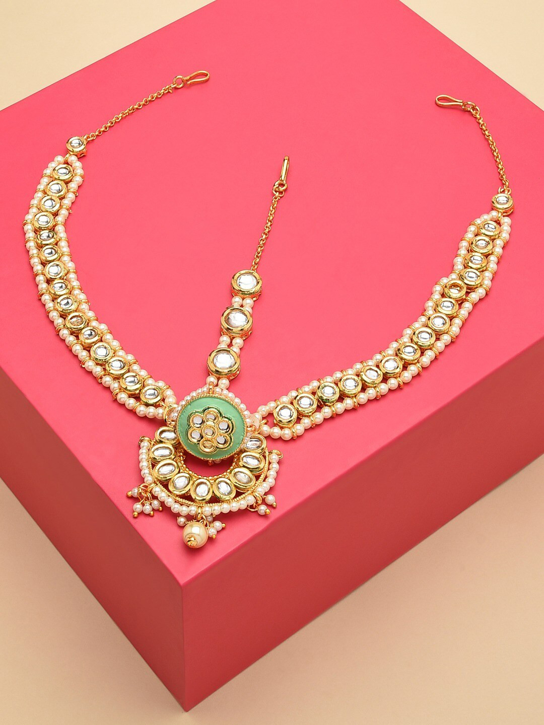 

Zaveri Pearls Gold Plated Green & White Kundan Studded And Pearl Beaded Matha Patti