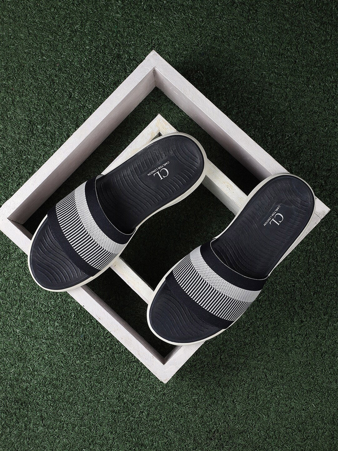 

Carlton London Men Navy Blue & White Striped Sliders