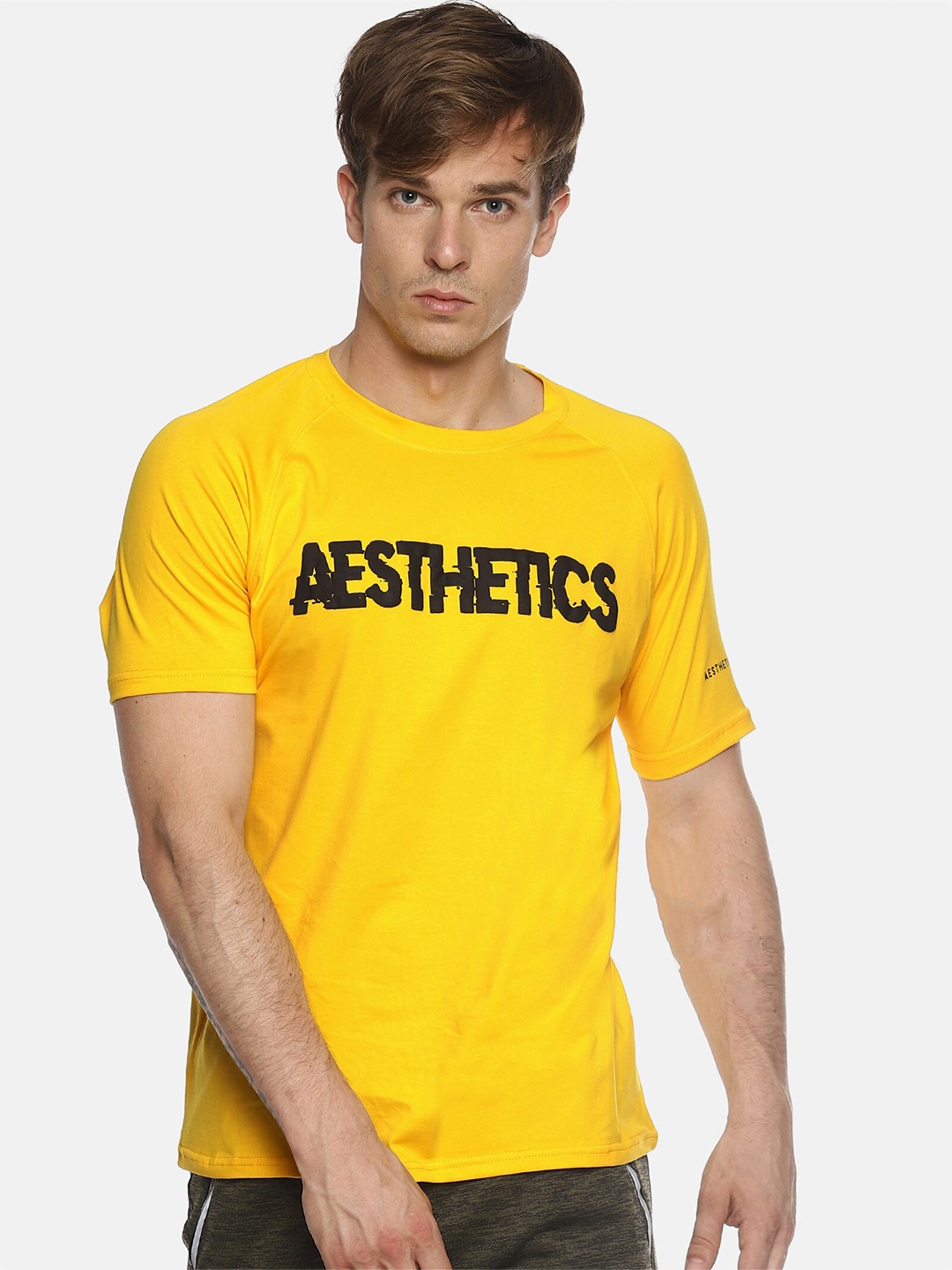 

AESTHETIC NATION Men Mustard Yellow & Black Typography Printed Training or Gym T-shirt