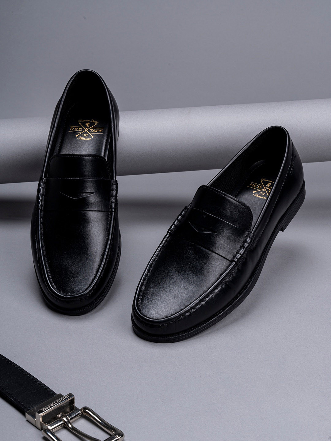 

Red Tape Men Black Solid Formal Slip On Loafers
