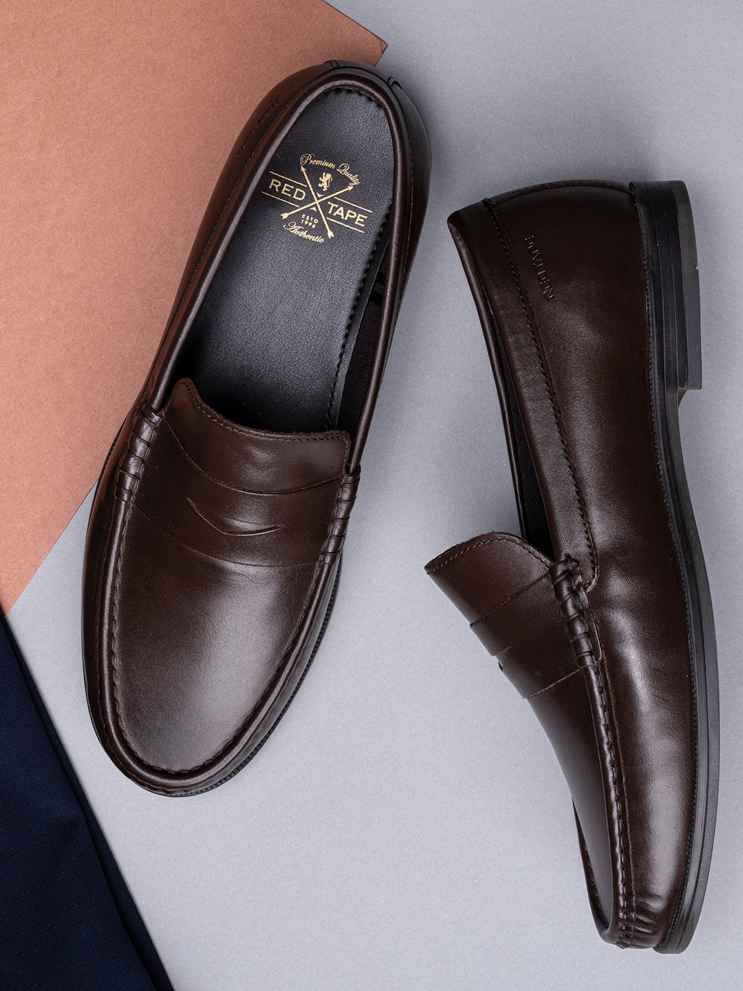 

Red Tape Men Brown Solid Leather Formal Loafers