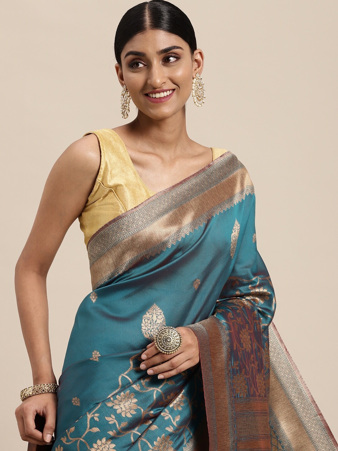 

Leeza Store Teal Blue & Golden Ethnic Motifs Zari Silk Blend Banarasi Saree