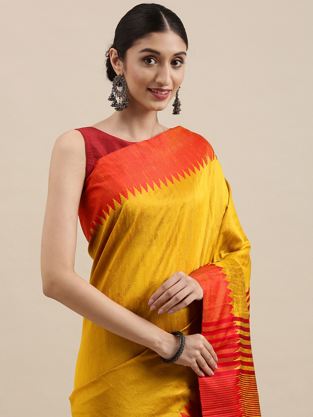 

Mitera Yellow & Rust Orange Solid Woven Border Saree