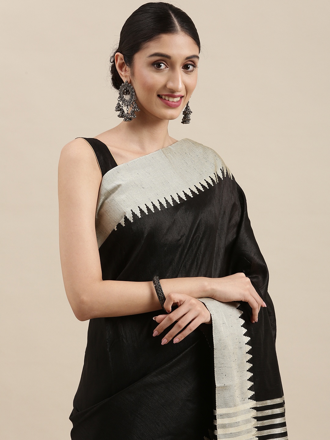 

Mitera Black & Grey Solid Woven Border Saree