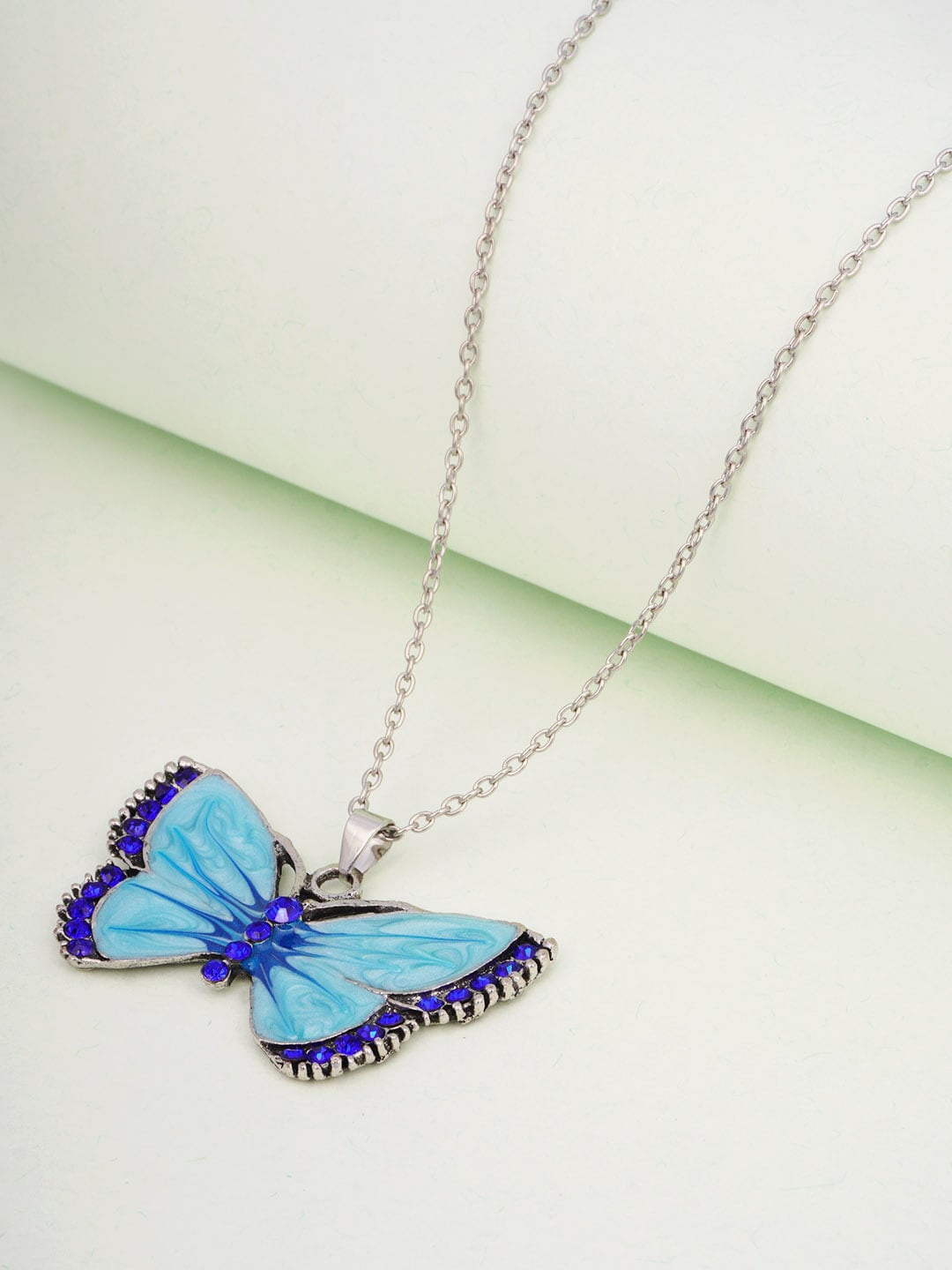 

Ferosh Blue Artificial Stone-Studded Butterfly Pendant