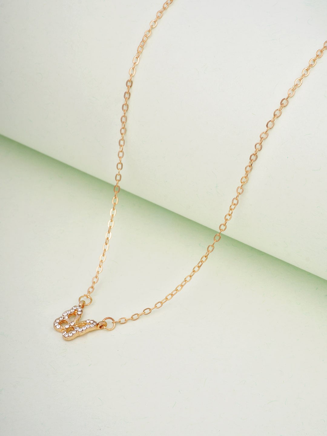 

Ferosh Gold-Toned & White Stone Studded Butterfly Pendant With Chain