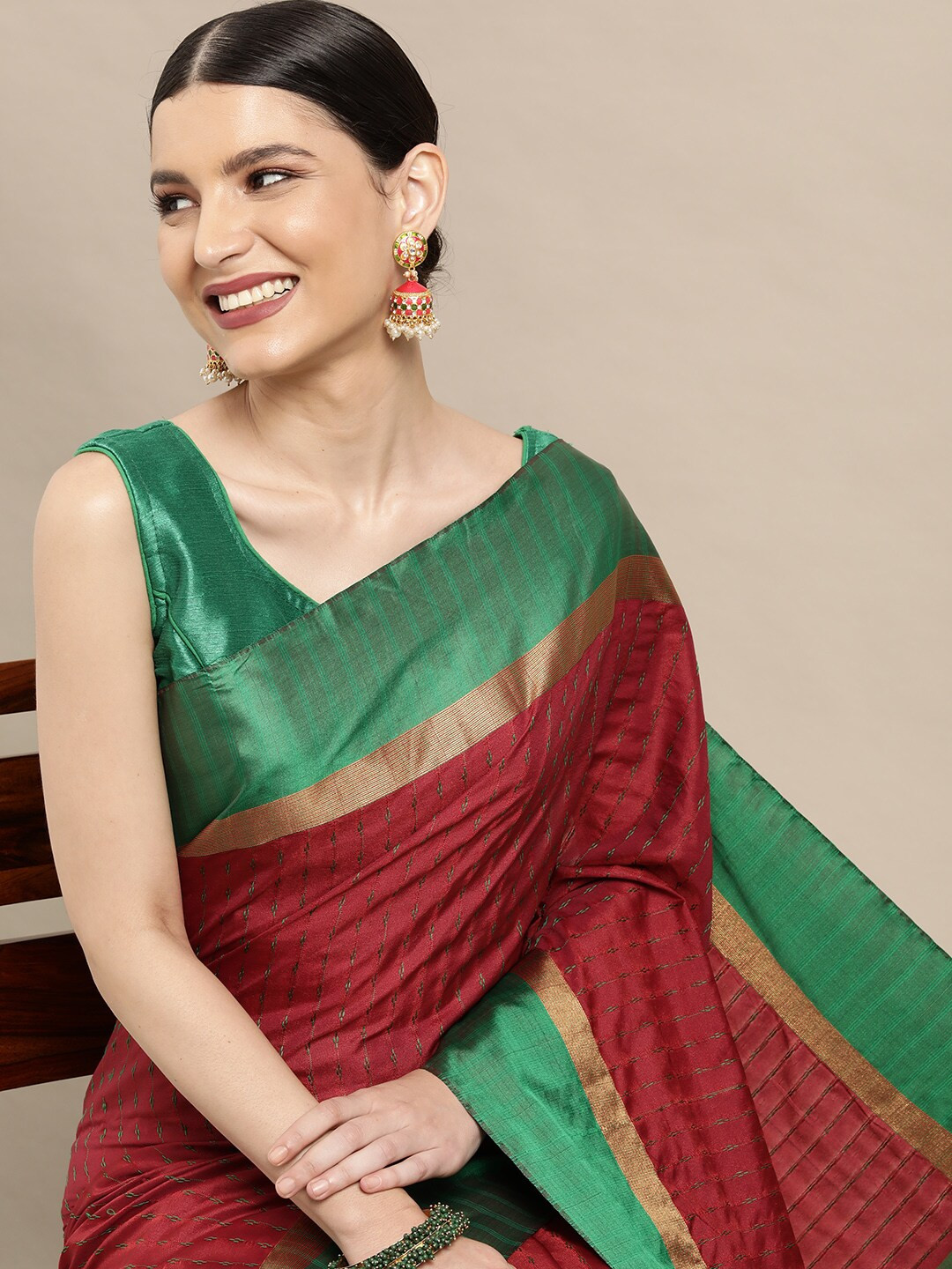 

Leeza Store Maroon & Green Striped Zari Silk Blend Saree