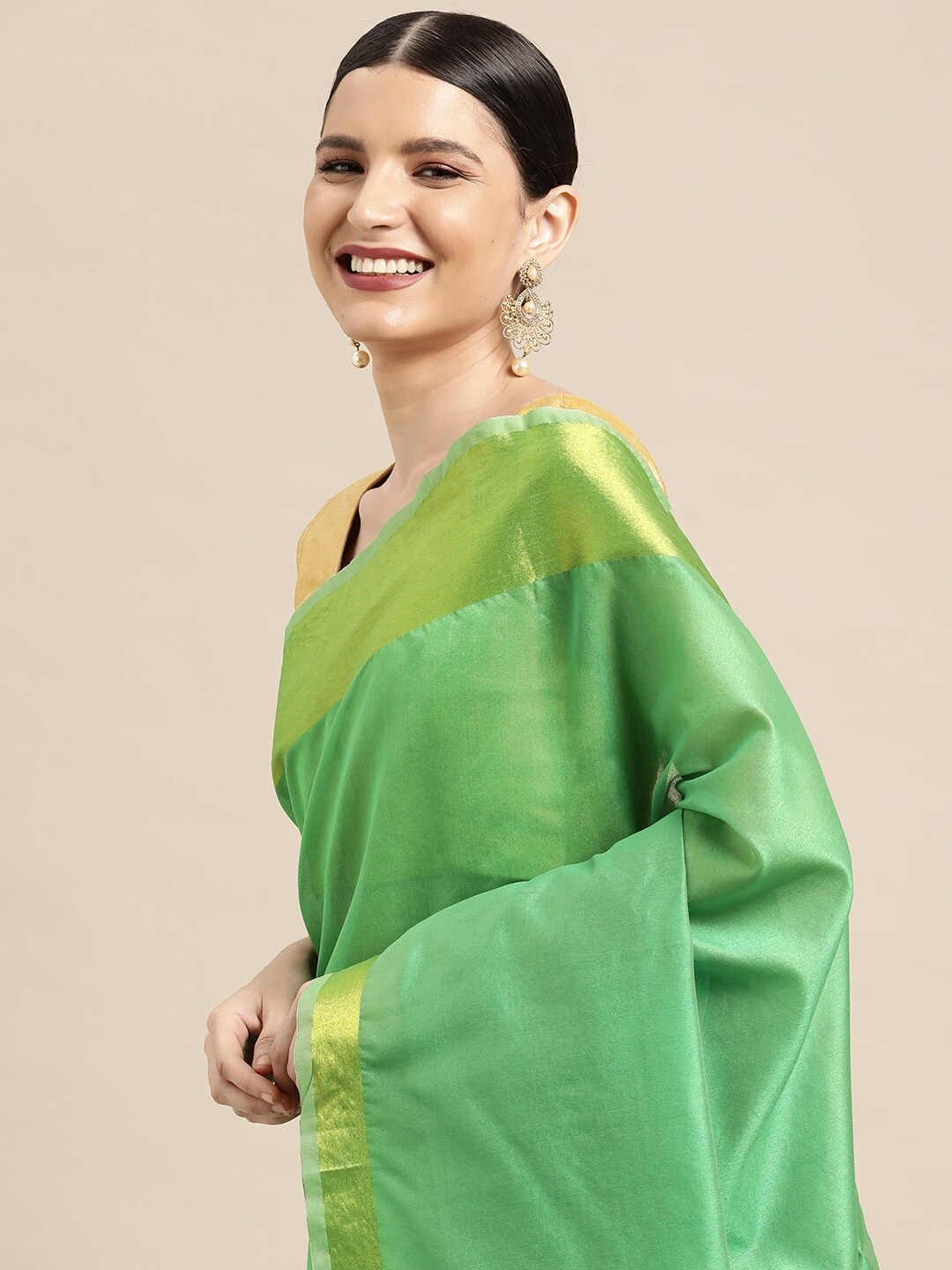 

Leeza Store Green Zari Kasavu Saree