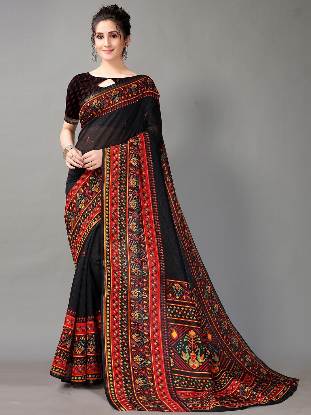 

HRITIKA Black & Orange Ethnic Motifs Art Silk Patola Saree