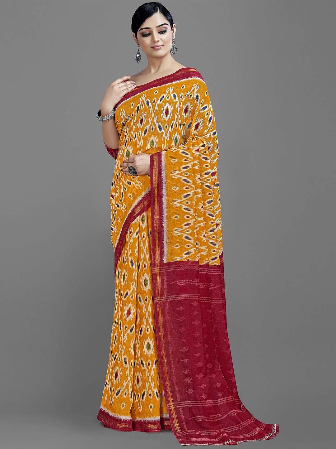 

HRITIKA Yellow & Red Ethnic Motifs Zari Ikat Saree
