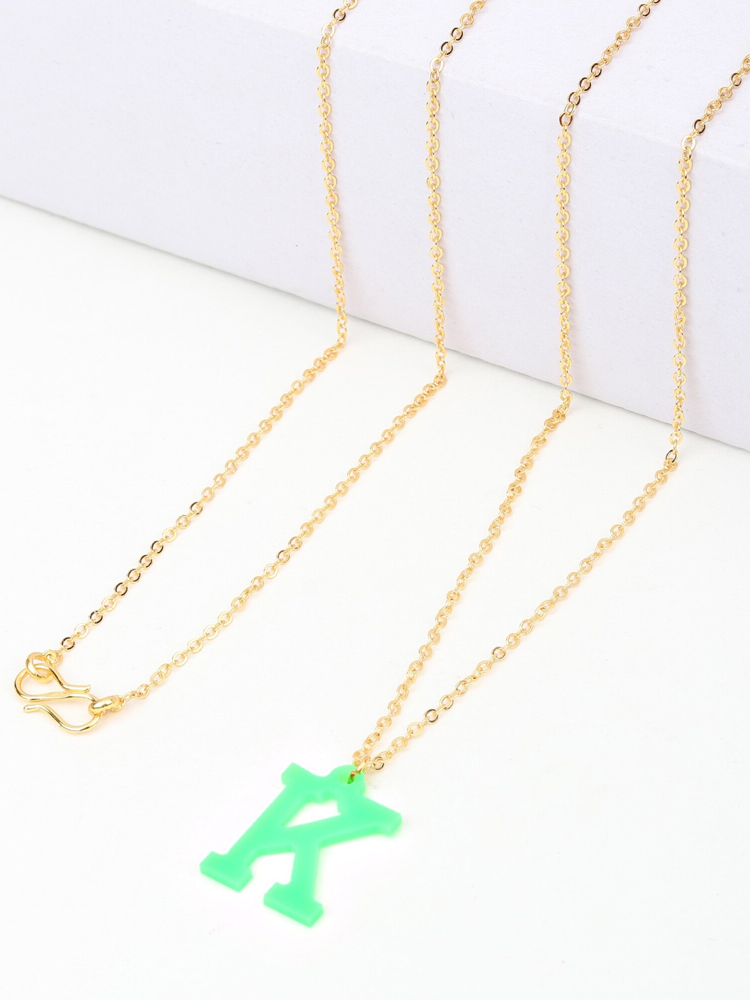 

Goldnera Girls Green K Alphabet Acrylic Pendant Combo with Shinny AD Ear Studs
