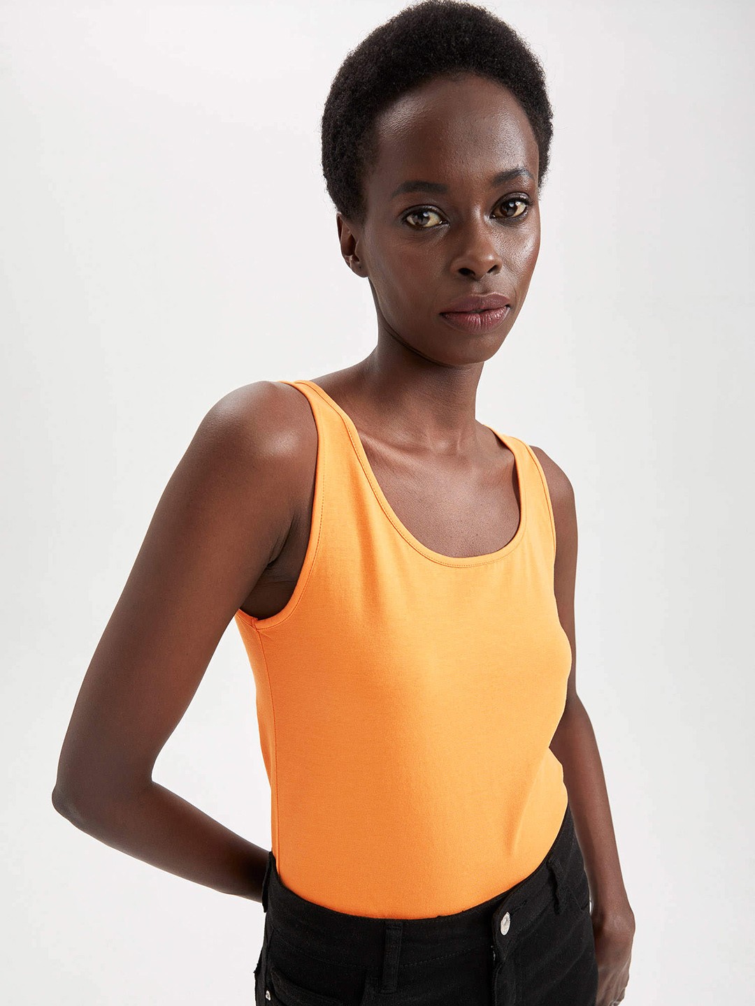 

DeFacto Women Orange Solid Top