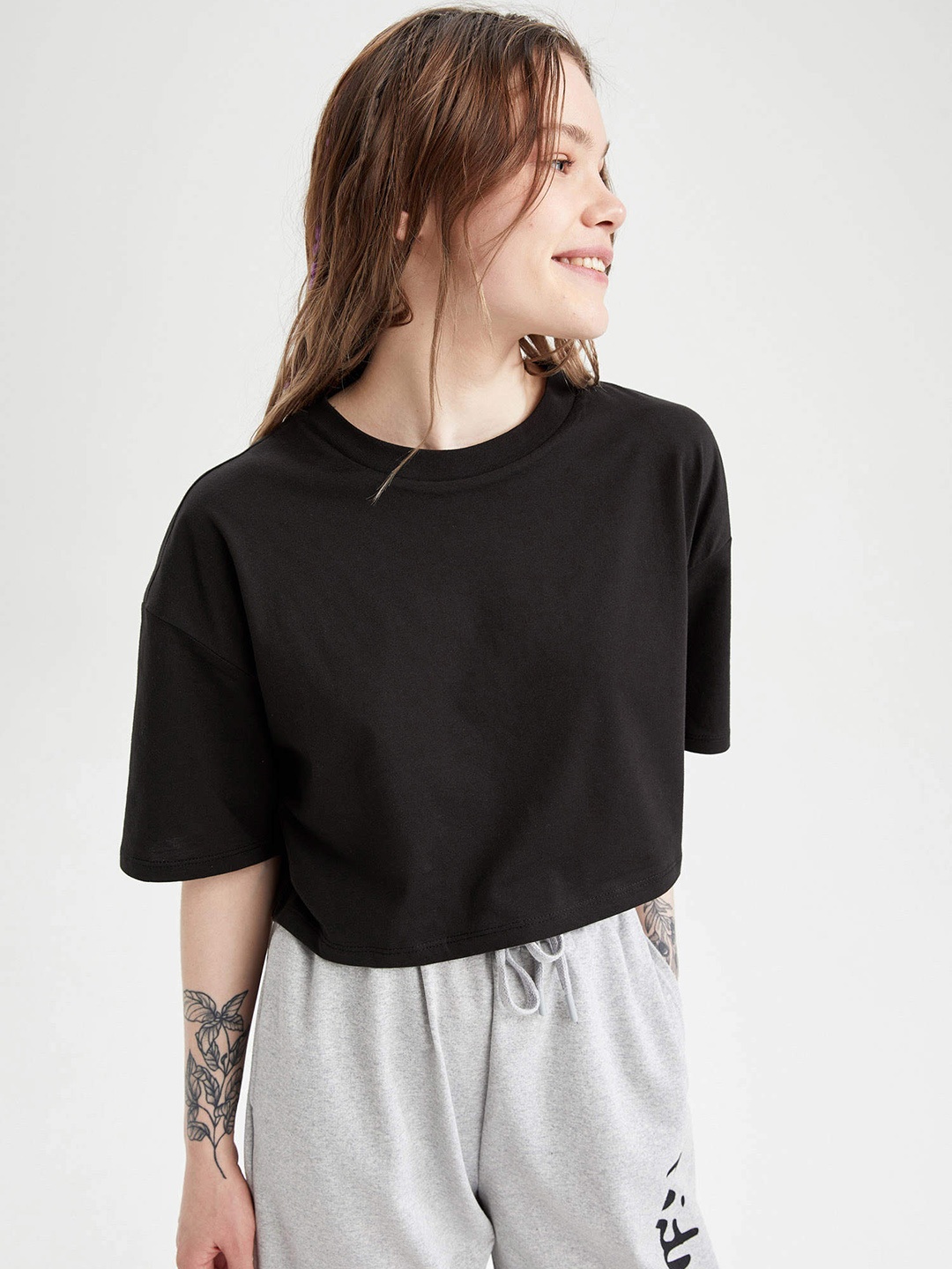 

DeFacto Women Black Pure Cotton Solid Loose Crop T-shirt